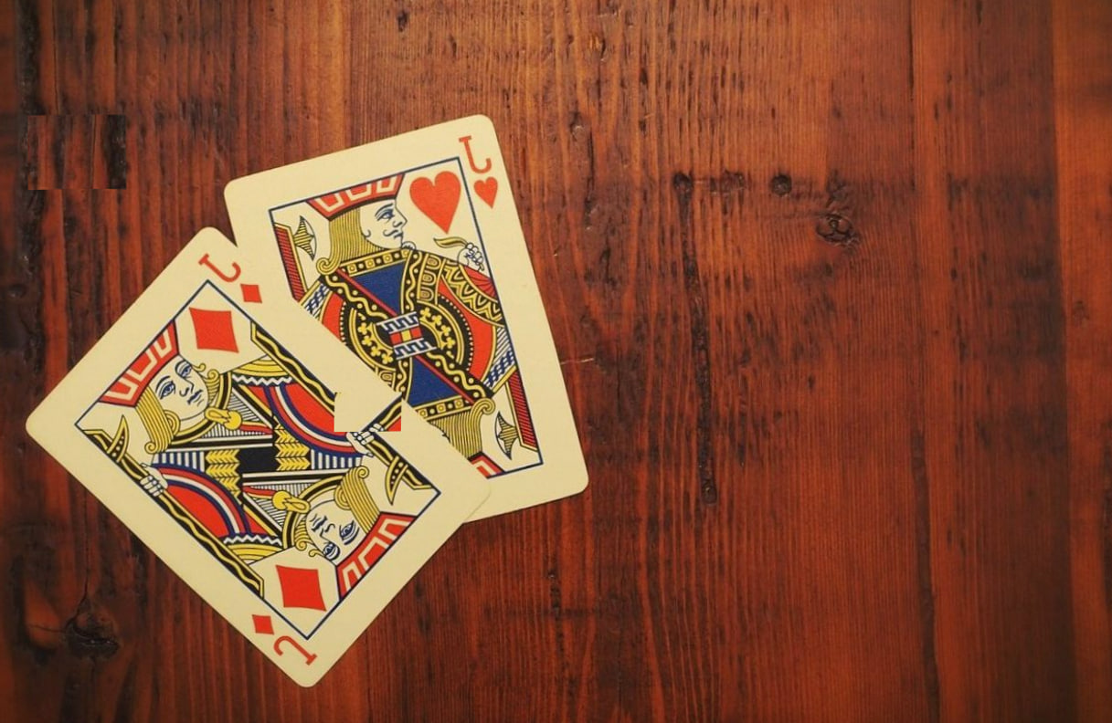 Cards and chips arranged for baccarat